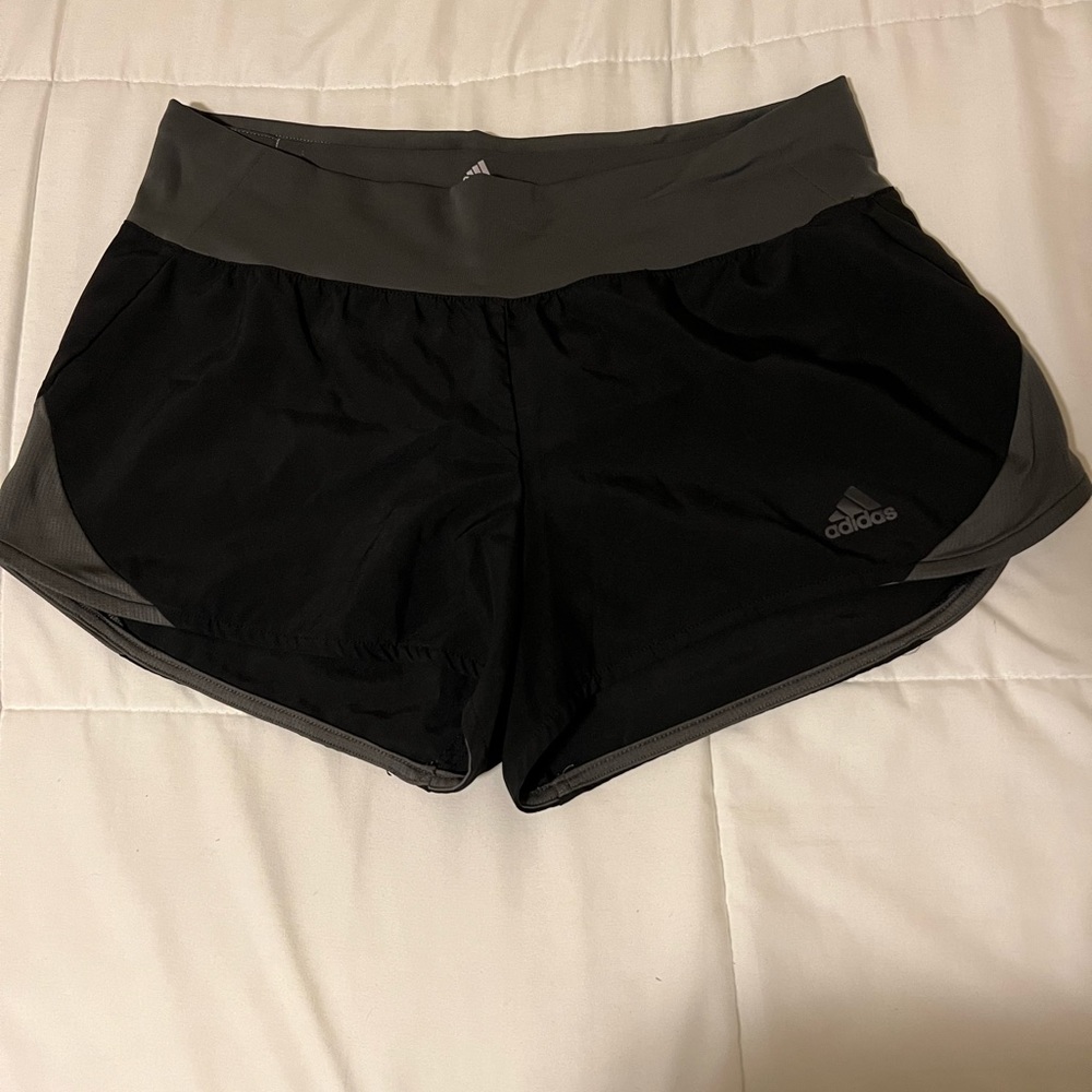 Adidas running shorts with undergarment attached. Size: M